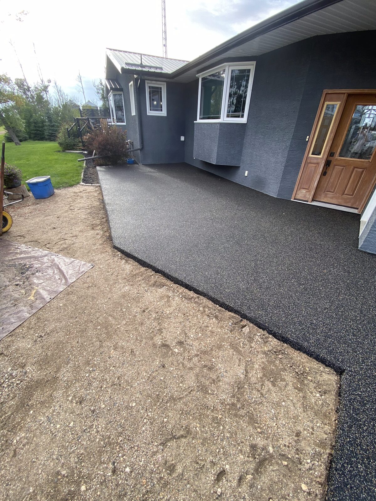 Rubber resurfaced driveway